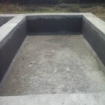 Réparation des bassins en béton pour rouir les maniocs