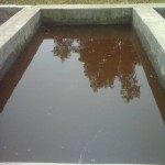 Réparation des bassins en béton pour rouir les maniocs