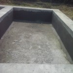 Réparation des bassins en béton pour rouir les maniocs