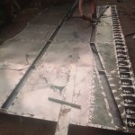 Fabrication des portes métalliques et placement de ces portes