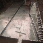 Fabrication des portes métalliques et placement de ces portes
