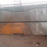 Fabrication des portes métalliques et placement de ces portes